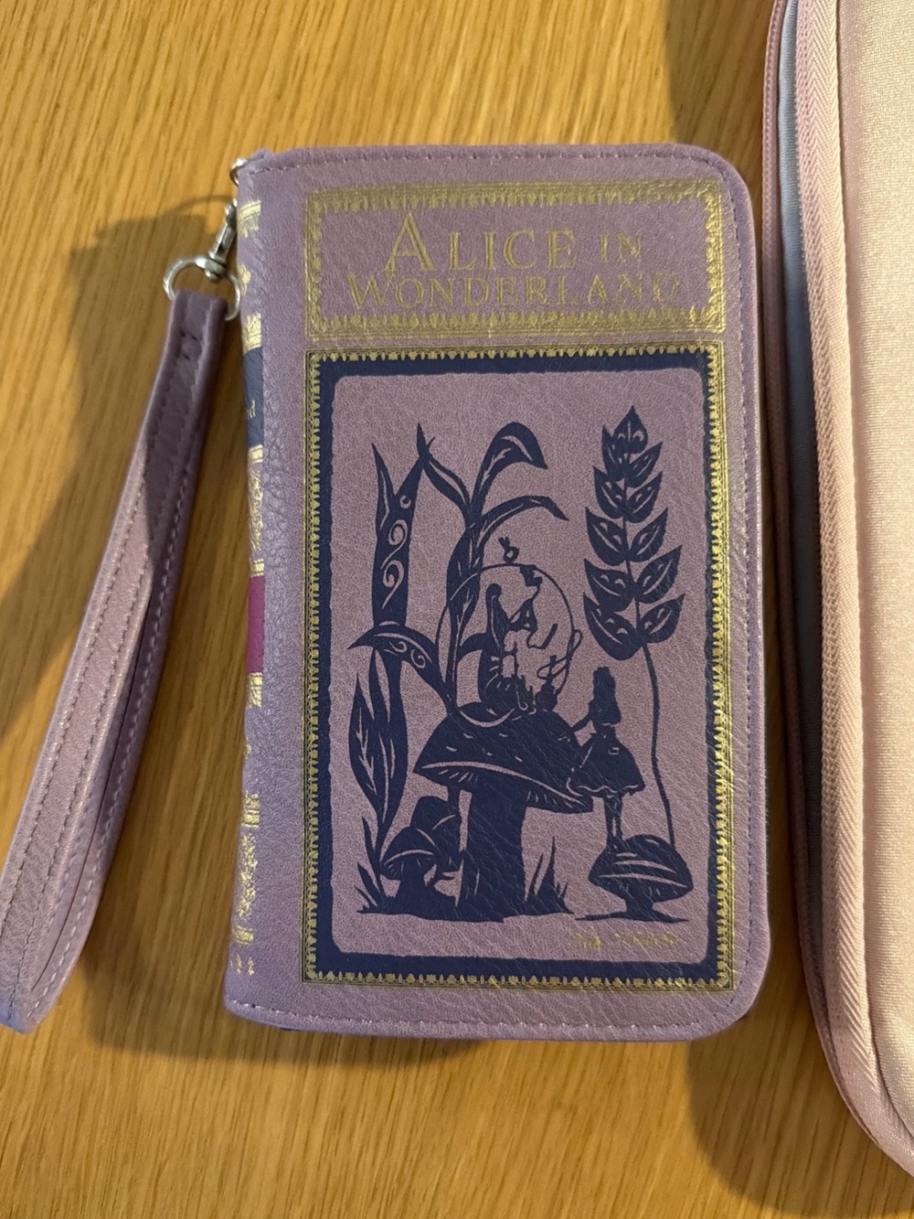 NWOT Alice in Wonderland book wristlet wallet